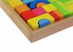 Colorful wooden puzzle blocks in a wooden frame on a white background