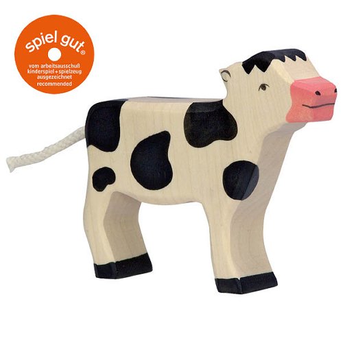 Wooden cow toy with black spots on a white background, featuring the 'spiel gut' logo.
