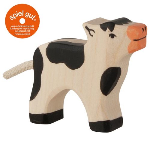 Wooden cow toy with black spots and orange nose on a white background, featuring the 'spiel gut' logo.