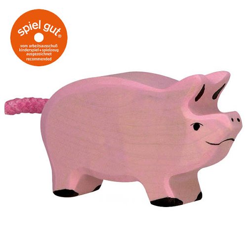 Pink wooden pig toy with 'spiel gut' certification logo on a white background