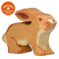 Wooden rabbit figurine with 'spiel gut' logo on a white background