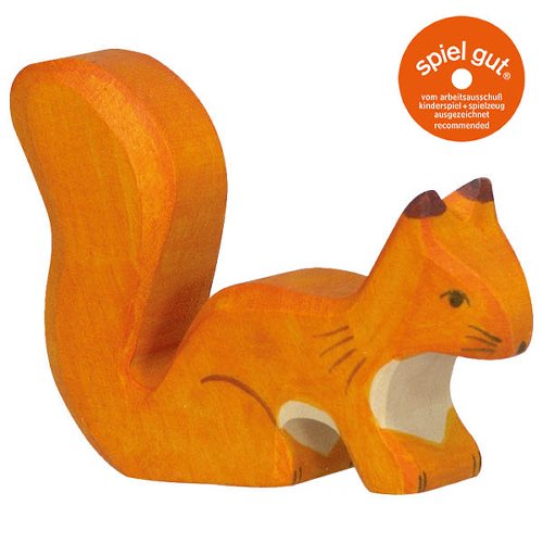 Wooden toy squirrel with 'spiel gut' certification label on a white background