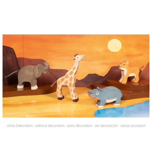 Set of toy animals including a giraffe, elephant, lion, and hippo on a wooden platform with a sunset background.