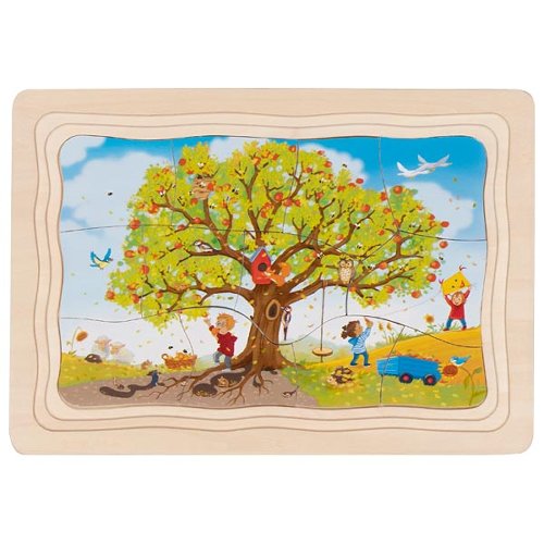 Children's puzzle with a tree and children around it on a white background