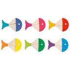 Set of colorful wooden fish toys on a white background