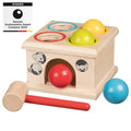 Wooden toy with colorful holes and a hammer, featuring the German Sustainability Award 2024 badge.