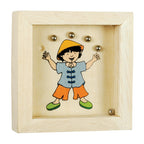 Wooden block with a colorful illustration of a child wearing a yellow hat, blue shirt, and orange shorts, set against a white background.