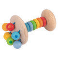 Colorful wooden baby rattle with beads on a white background