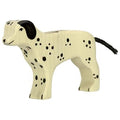 Wooden dog toy with black spots on a white background