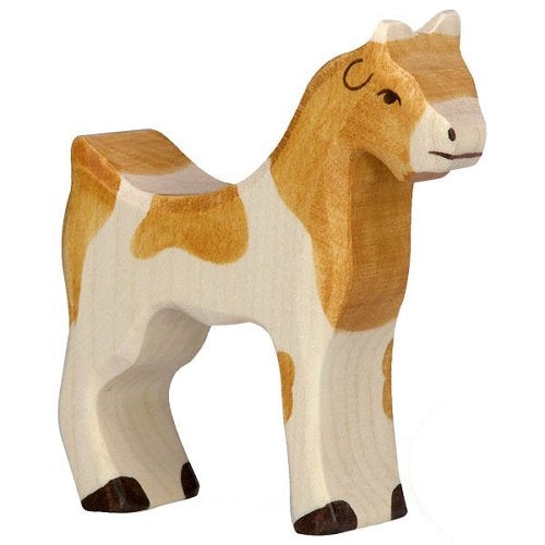 Wooden goat toy with brown and white pattern on a white background