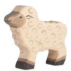 Wooden lam toy with brown face and legs on a white background