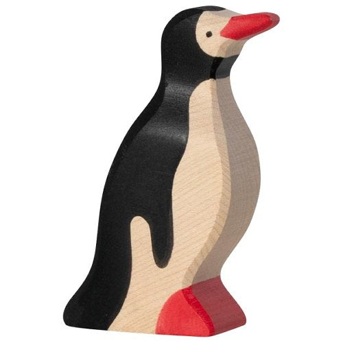 Wooden penguin figure with black, beige, and red colors on a white background