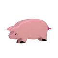 Pink pig-shaped toy on a white background