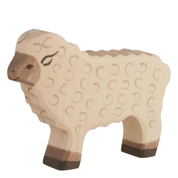 Wooden sheep figure on a white background