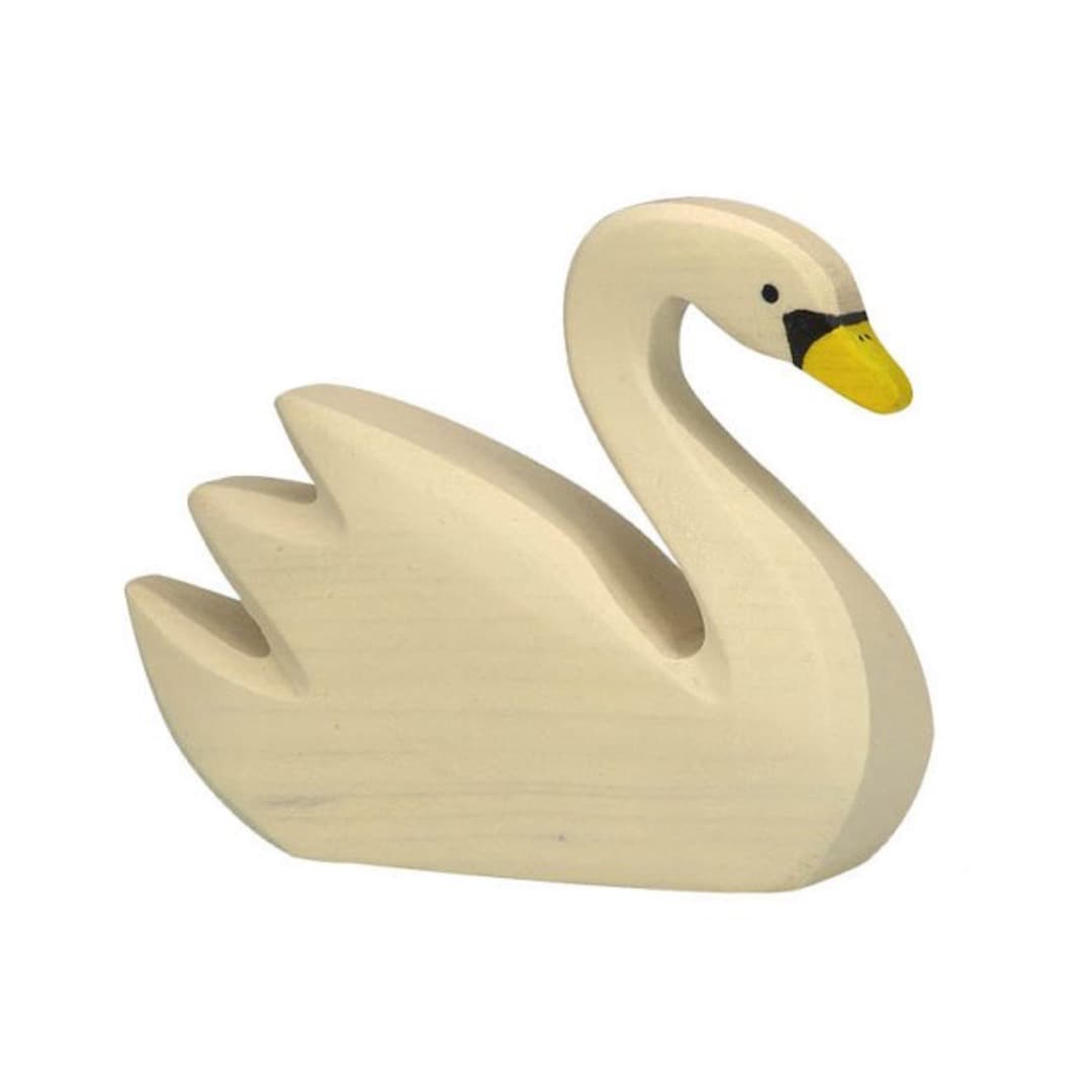 Wooden swan figure on a white background