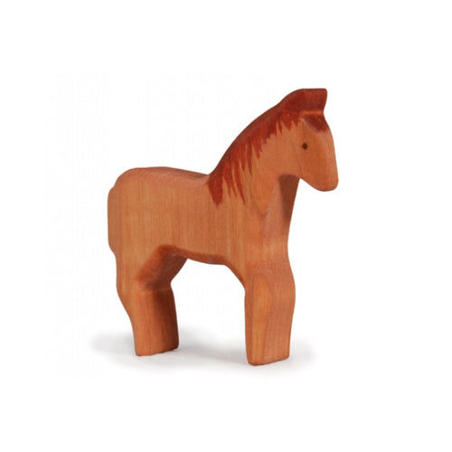 Wooden horse figurine on a white background